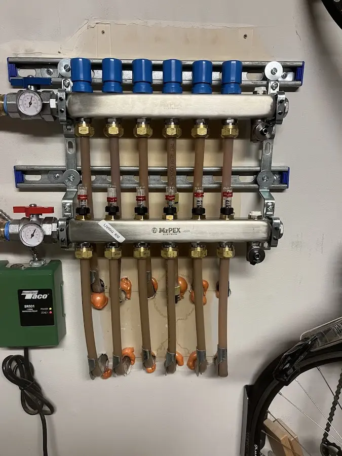 Plumber performing Gas Line Installation at a residential property in Lunenburg